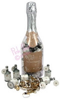 champagne bottle of party poppers