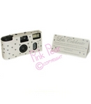 white camera with silver hearts